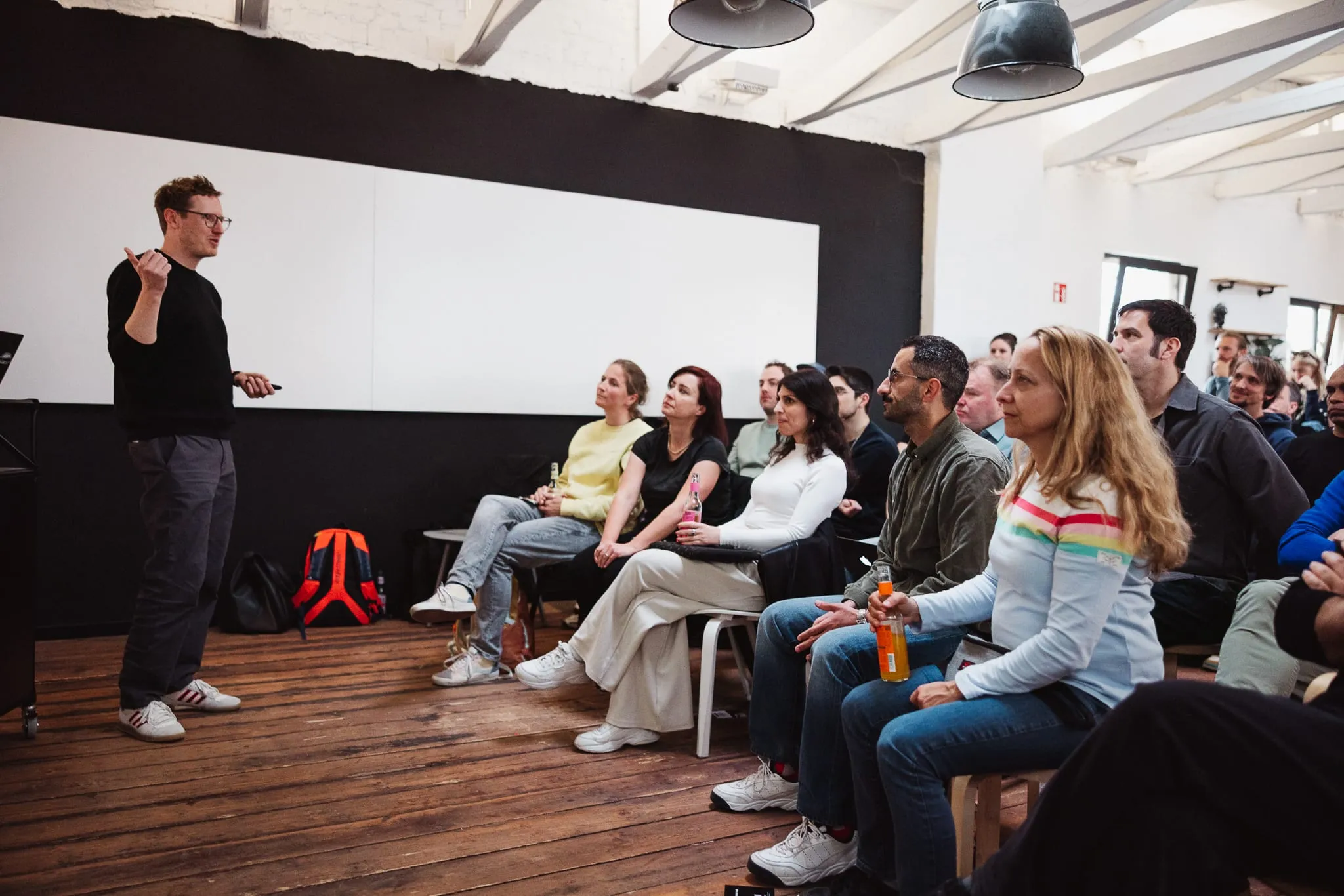 Jan Hoppe leading a workshop in front of a group of product people